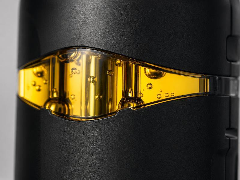 Upclose of ember colered live rosin in a vape